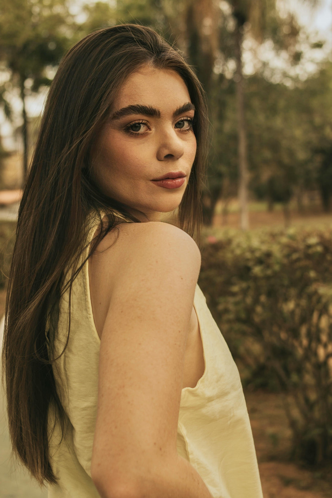 Transform Your Hair with Atelier Silente's Peptide Hair Growth Serum - woman with long, healthy hair outdoors