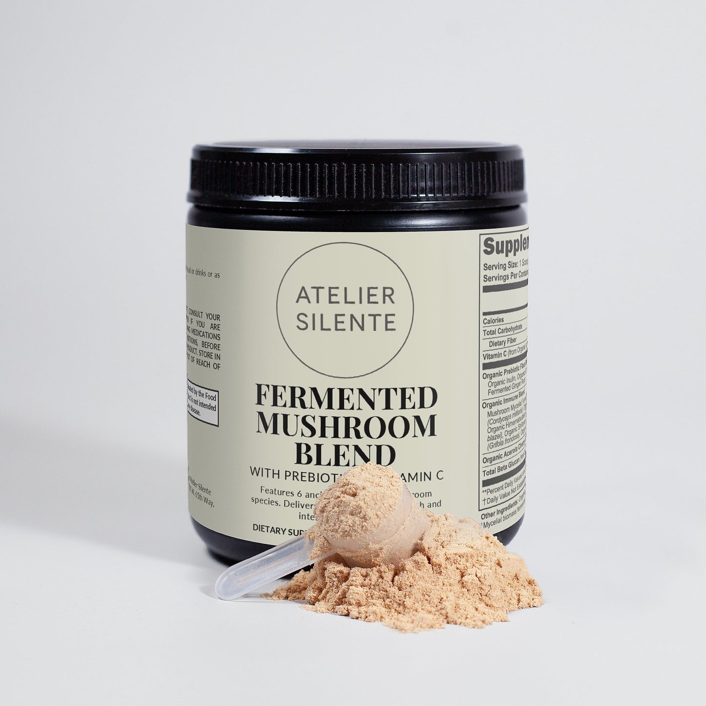 Atelier Silente Fermented Mushroom Blend jar with powder and scoop for daily immunity support.