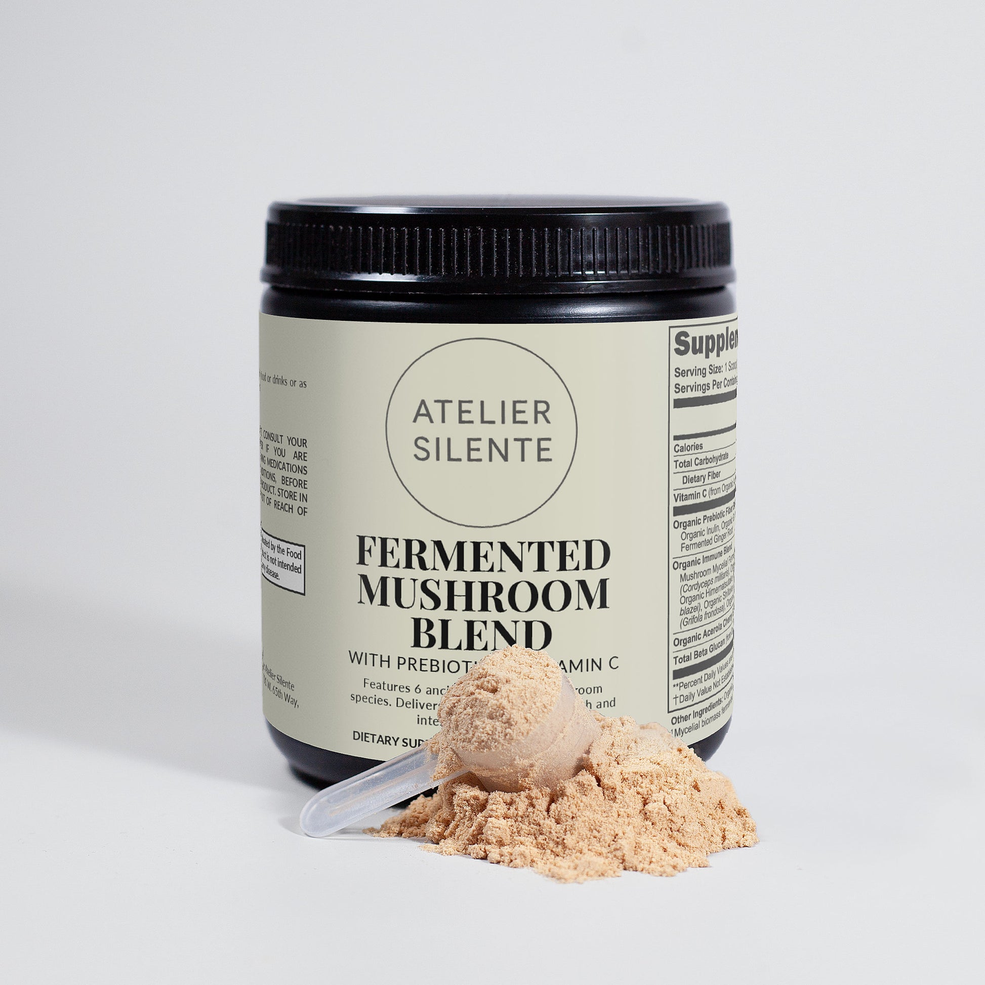 Atelier Silente Fermented Mushroom Blend jar with powder and scoop for daily immunity support.