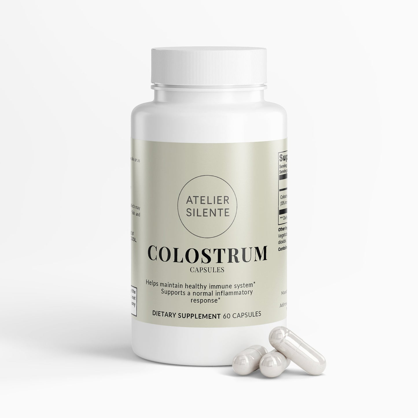 Colostrum Capsules bottle and three capsules, supporting digestive comfort and immune health.