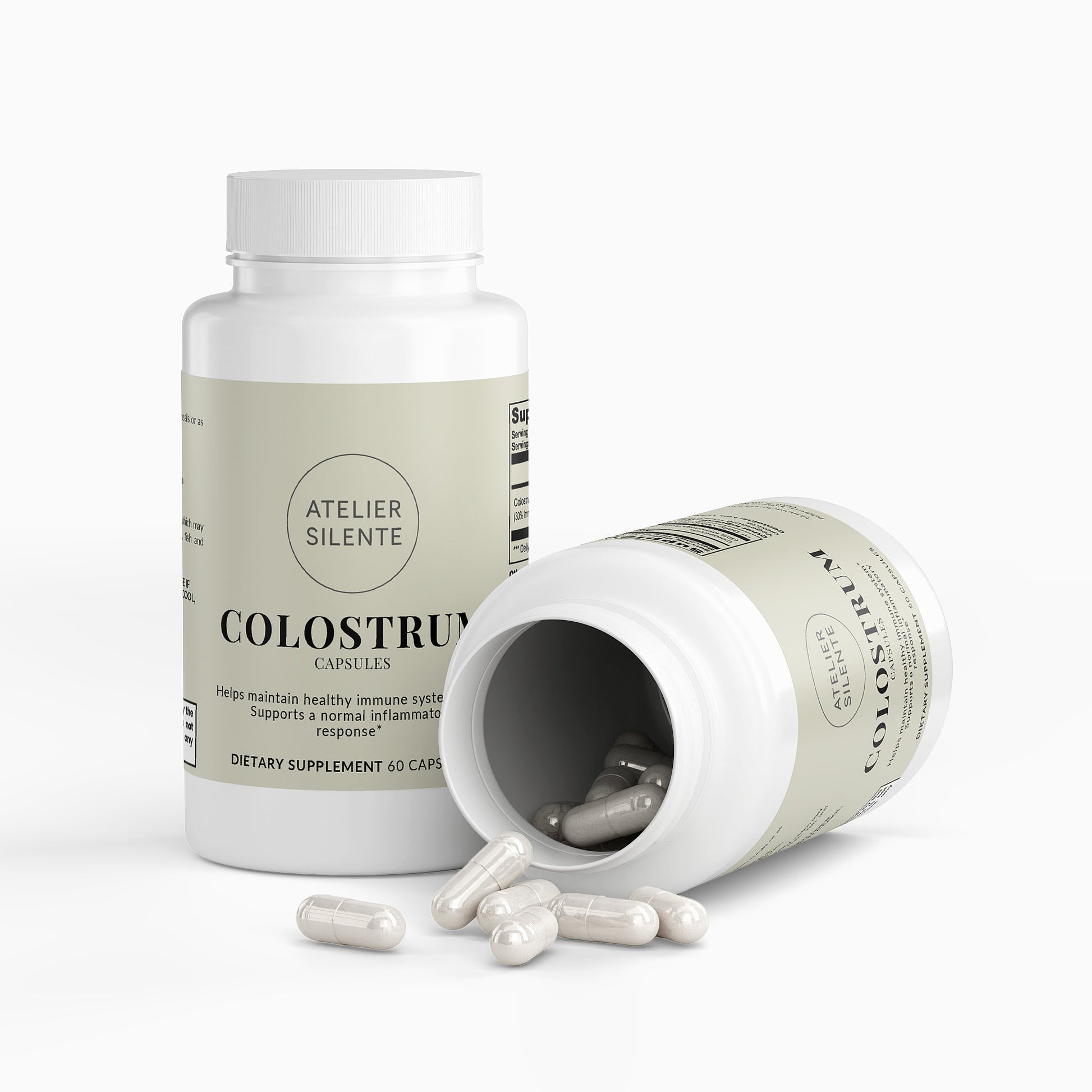 Colostrum Capsules bottle with capsules spilled out, promoting digestive comfort and immune support.